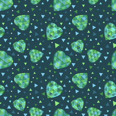 Scattering of green emeralds in the shape of a heart, the facets are blue and green. Seamless vector background for design.