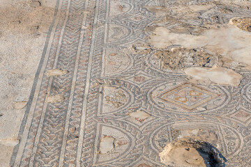 Mosaic floor of the large public building used as a market at Tzipori National Park in Israel.
