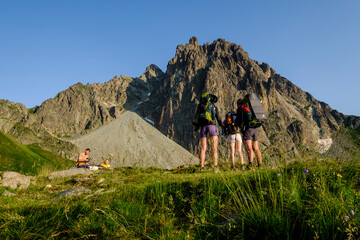 hikers planning the day, Pombie shelter, Pyrenees National Park, Pyrenees Atlantiques, France