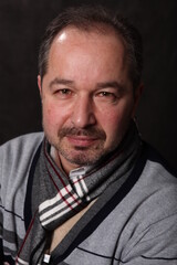 portrait of a man, various poses, looking at the camera, black background, pavilion, half-length portrait