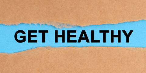 The paper is ripped in the middle. Inside on a blue background it is written - Get Healthy
