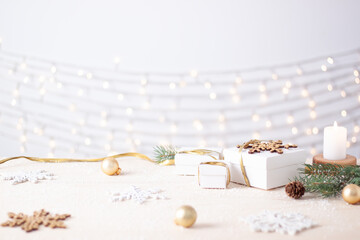 Christmas decorations with gifts on white background. Close up, copy space
