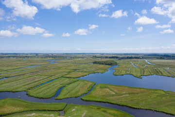 Aerial view of  over Historic dutch Waterland landscape in may, the ilperveld near Den Ilp and Landsmeer the  Netherlands