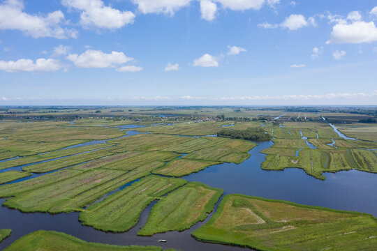 Aerial view of  over Historic dutch Waterland landscape in may, the ilperveld near Den Ilp and Landsmeer the  Netherlands