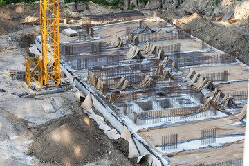 Crane and building construction site