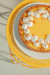 Southern style icebox lemon pie on yellow background