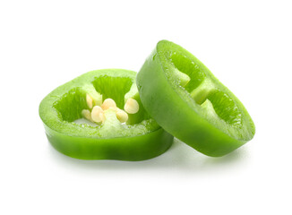 Slices of green jalapeno pepper on white background