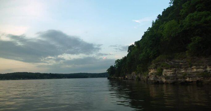 Birds flying along shore on lake in Ozarks