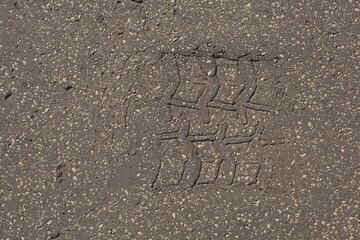 The pattern on the asphalt