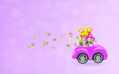 Pink retro car with a gift box on the roof and flowers on a pink background. Vector