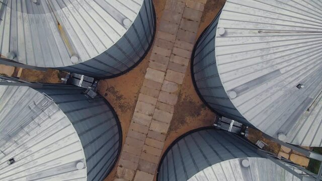 Grain elevator at modern agro processing factory. Aerial view