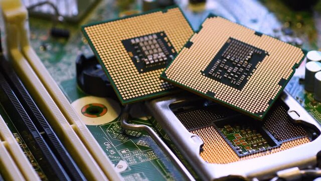 Detail of the Socket of PC Motherboard and components with CPU Computer Processors over
