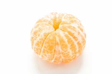 peeled tangerine on white background