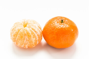 two tangerine on white background