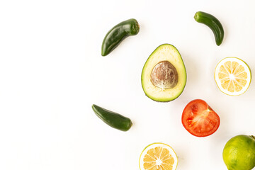 Conceptual photo made of avocado, lemon and tomato