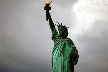 Fototapeta premium Statue of Liberty, Cloudy Backdrop