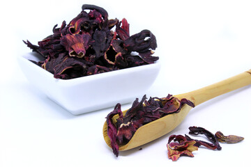 Dried hibiscus petals on white background.