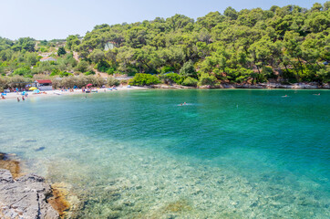 Picturesque pebble Zastup beach nearby Splitska which is situated on the north coast of Brac island in Croatia.