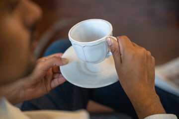 person drinking coffee