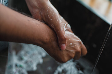 washing hands with water and soap