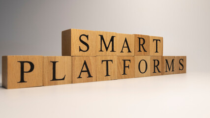 Smart platforms are created from wooden cubes. Industry and technology.