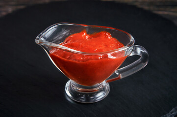 red sauce for shish kebab in a glass sauce bowl ketchup