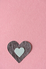 isolated heart on a pink paper background