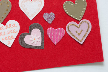 dreamy paper hearts on a deep red background
