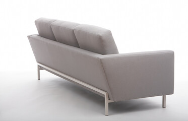 back angle of a modern grey couch with a white background 