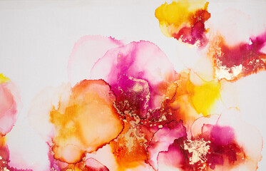 Abstract fluid art. Alcohol ink on canvas. Red, yellow, and gold