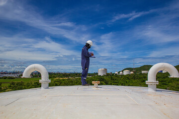 Male worker inspection visual tank