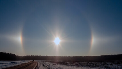 A halo is an optical phenomenon, a luminous ring around the sun