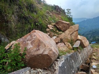 the big rock on the edge of the cliff