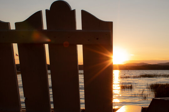 Adirondack Chair Overlooking Lake Sunset