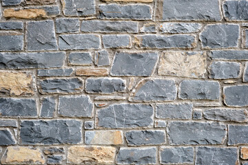 Background from an old natural stone wall