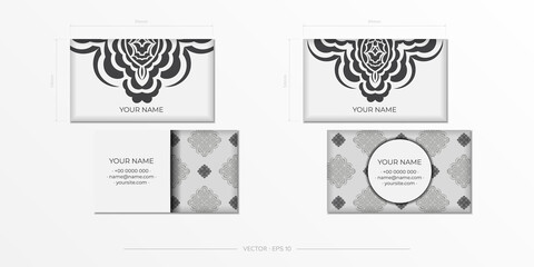 Business cards in white with gorgeous vector patterns with mandala patterns. Business card design with monogram ornament.