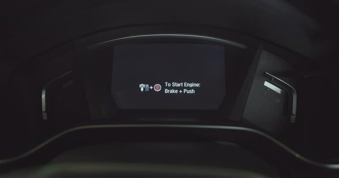 Digital car dash, dashboard,  or instrument panel during ignition or starting the engine. Dashboard is a control panel set in a vehicle, displays instrumentation and controls for vehicle operation.