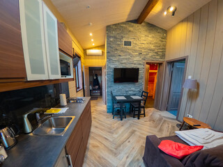 Dwelling interior. Kitchen, hallway and bathroom in the house. A house with open doors. Rooms of a house without people. Apartments design. Rental property. Purchase of apartments.