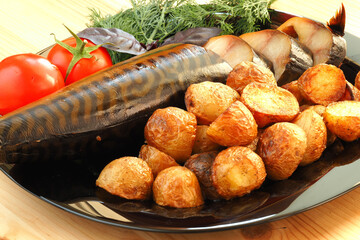 Smoked fish, cold smoked mackerel, sliced with potatoes.