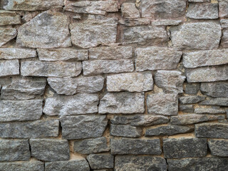 Backgrounds of the old fortress wall. Ancient historic Genoese castle or fortress
