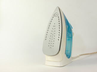 Electric Steam iron on white background. Empty copy space for text.