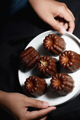 Canneles de bordeaux ,Traditional French sweet dessert,food concept.