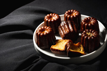 Canneles de bordeaux ,Traditional French sweet dessert,food concept.