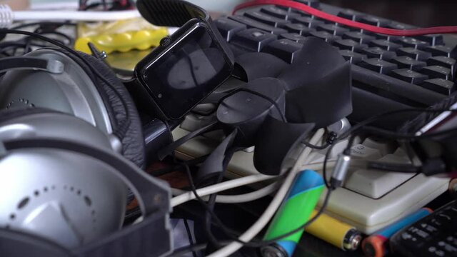 E-waste, Used electronics, Electronic scrap components, harmful materials. Recycling and disposal of e-waste. Broken phones, computers and wires