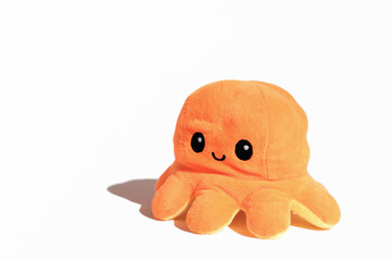orange toy octopus isolated on white background. underwater animal collection - obrazy, fototapety, plakaty