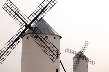 Traditional white windmills on countryside in Castilla la Mancha, Spain