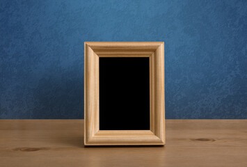 frame on table, blue wall