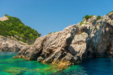 Fototapeta na wymiar rocky coast of greek island and sea view, landscape greece view from boat