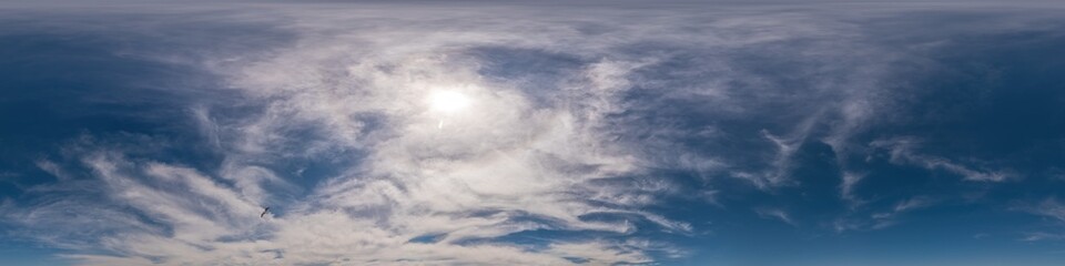 Obraz premium Blue sky panorama with Cirrus clouds. Seamless hdr 360 degree pano in spherical equirectangular format. Complete zenith for 3D visualization, game and sky replacement for aerial drone 360 panoramas.