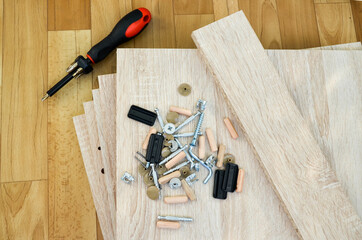 Chipboard sheets, tools and parts for assembly of cabinet furniture. Self-assembly of furniture at...